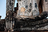 Thailand, Old Sukhothai - Wat Mahathat, detail of the seated Buddha statue of the vihan. 